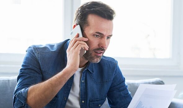 A man checks his finances