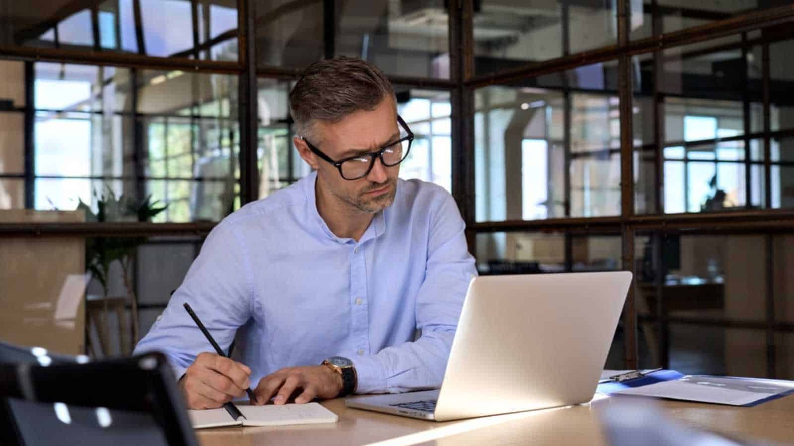 Man writing down