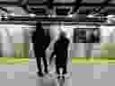 People wait on the platform to enter a subway train in downtown Toronto. 