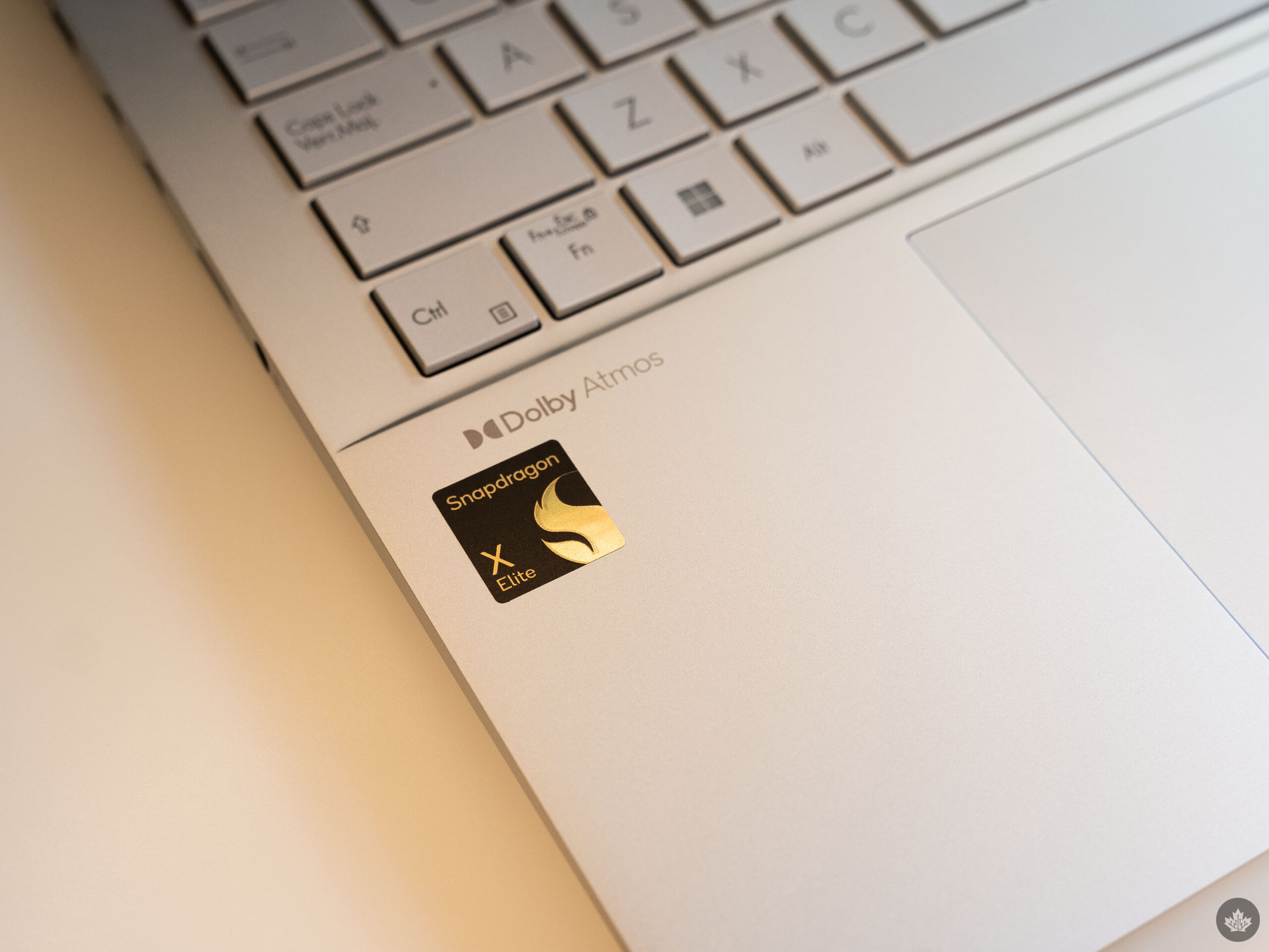 Snapdragon X Elite logo on an Asus Vivobook S 15.