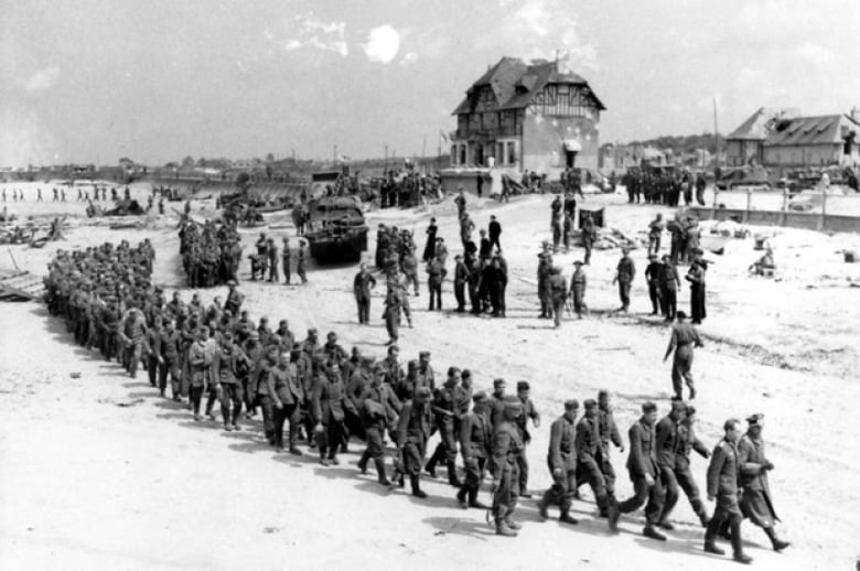 Canadian soldiers on Juno Beach, D-Day, June 6, 1944.