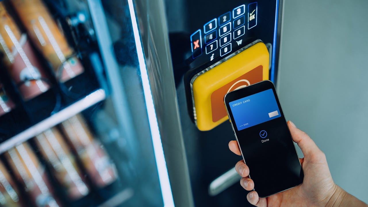 using a digital wallet to buy something from vending machine