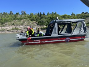 Edmonton firefighters do a water safety demonstration on the North Saskatchewan River.