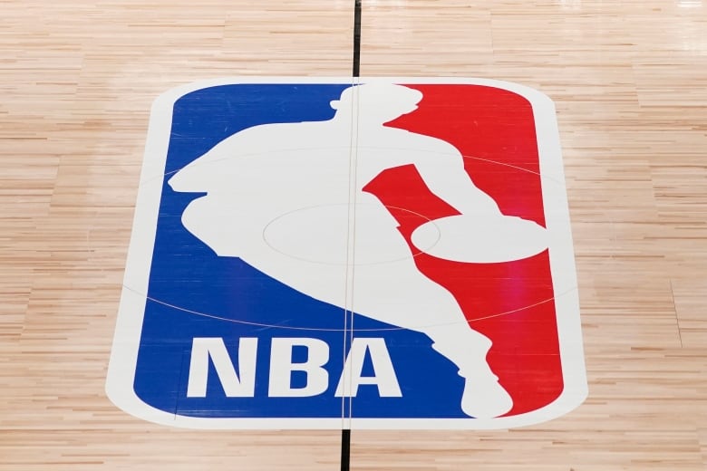 The NBA logo in shown on a basketball court in Lake Buena Vista, Fla., Friday, Aug. 28, 2020.