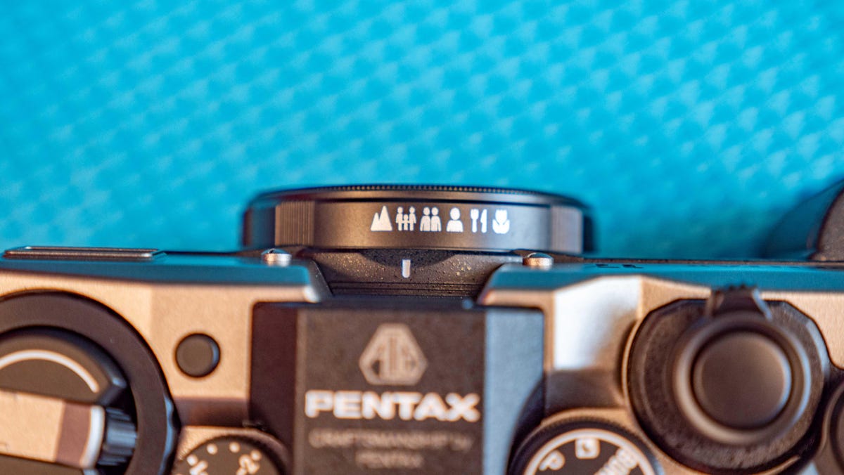 Close-up of the Pentax 17 zone-focus dial on the camera's lens.