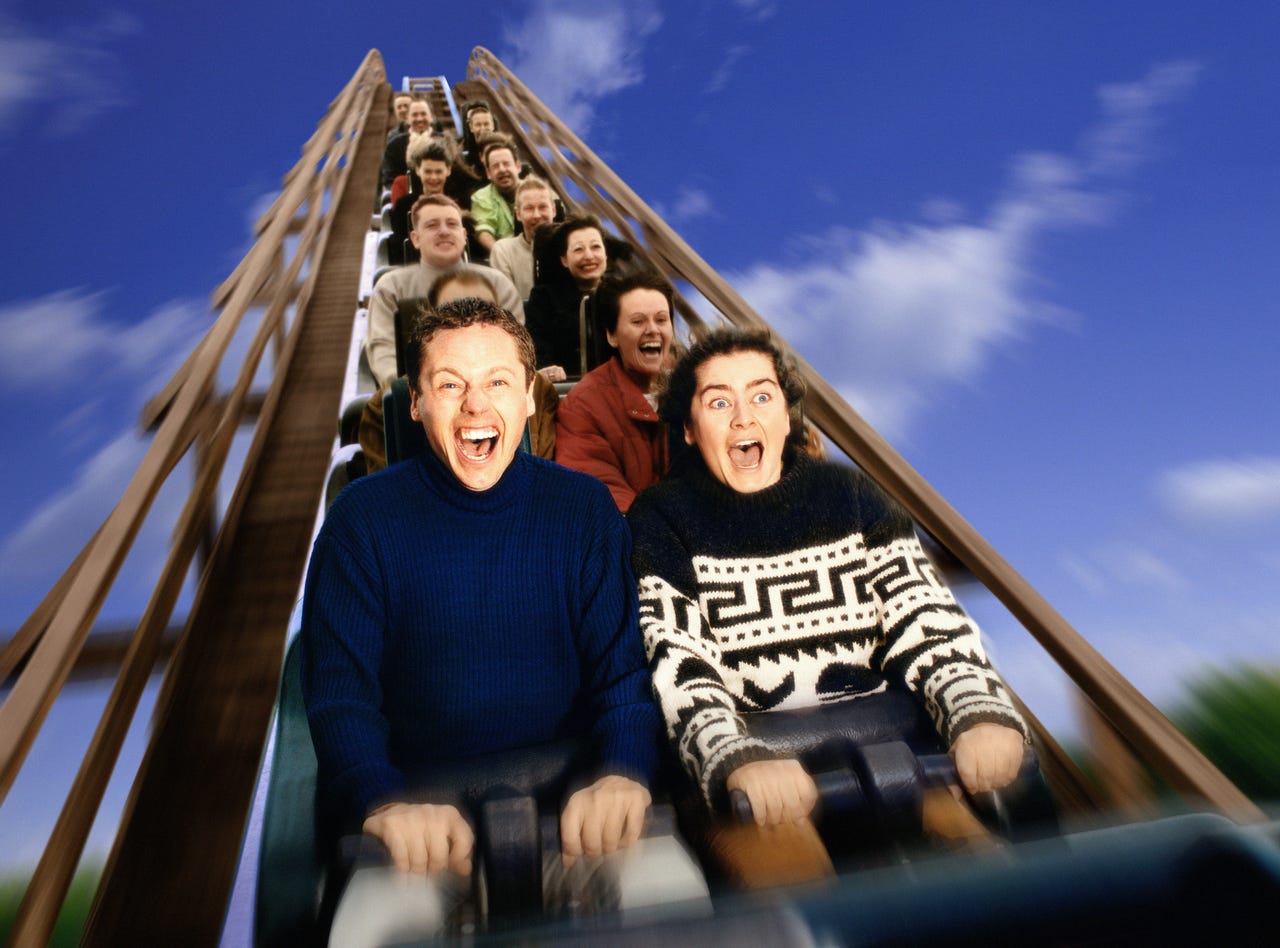 people-on-rollercoaster-ride-gettyimages-bc8483-001