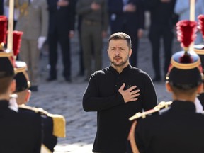 Ukrainian President Volodymyr Zelenskyy attends a military honor ceremony, Friday, June 7, 2024 at the Invalides monument in Paris.