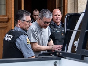 Former RCMP officer Bernie Herman exits the Court of King's Bench in Prince Albert, Sask., Thursday, April 25, 2024. A judge is expected to give his sentencing decision today for a former Saskatchewan Mountie who shot and killed his lover in a park.