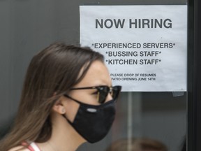 A pedestrian wearing a mask