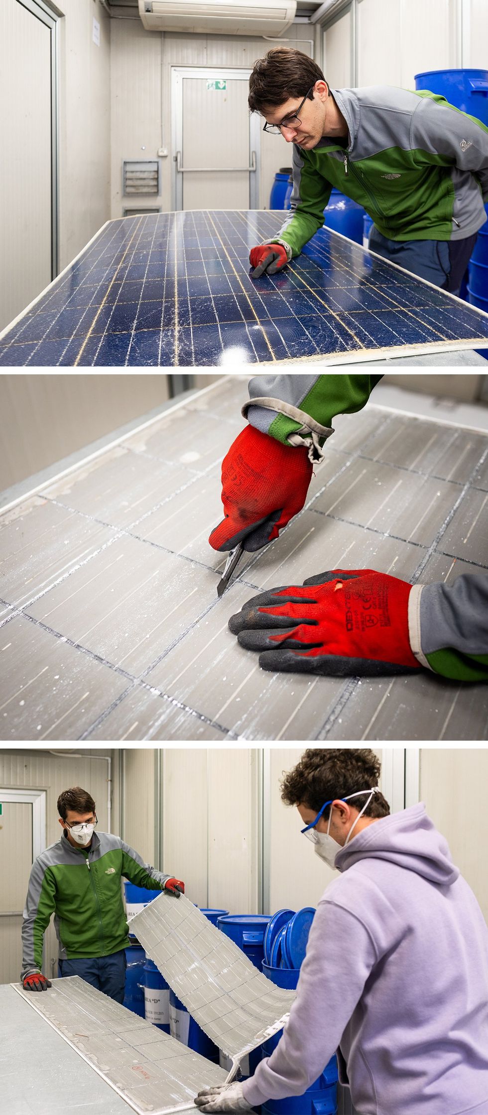 Workers wearing ventilation masks handle the inner layers of a PV panel